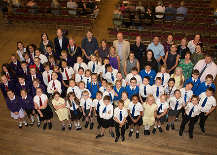 Pupils from Barton school standing alongside the judges