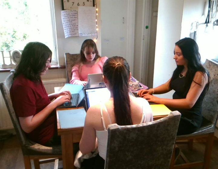 Allen children doing school work on the laptops
